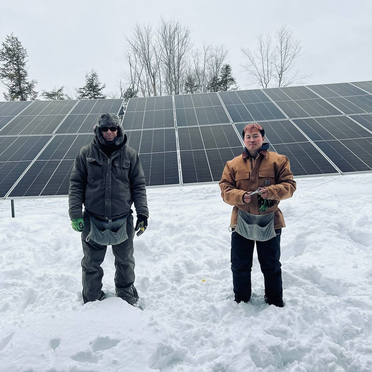 Skilled Trades Parnets tradesmen in snowy solar New England solar field