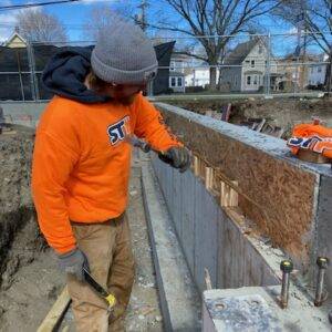Professional carpenter working on commercial construction job site
